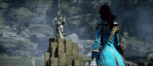 a woman in a blue coat is standing next to a statue