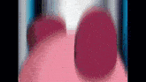 a close up of a person 's face with a pink circle in the middle