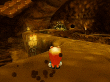 a cartoon character is standing in a cave with a chocolate bar behind him