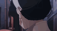 a close up of a woman 's ear with a circular design on it
