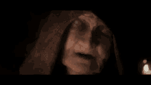 an elderly woman with a hood on her head says without really knowing why ...
