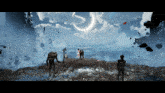 a group of people standing on top of a hill with a crescent moon in the background