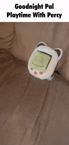 a stuffed animal that says goodnight pal playtime with percy on the bottom