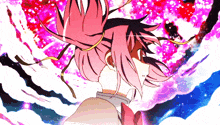 a girl with pink hair and a bow on her head