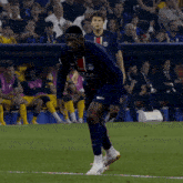 a soccer player wearing a jersey that says " qatar airways "