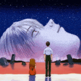 a man and a woman are standing in front of a giant statue of a woman 's face