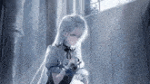 a girl with white hair is standing in front of a window holding a bottle .