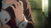 a close up of a person 's hand on a person 's chest