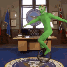 hillary clinton unicycle frog costume oval office