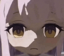 a close up of a anime girl 's face with a shadow on her face .