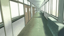 a long hallway with many windows and doors