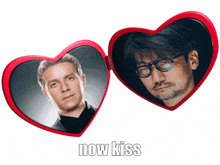 two red heart shaped mirrors with the words now kiss