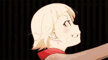 a girl with blonde hair and a red shirt is looking up at something in the dark .