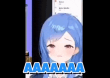 a blue haired anime girl with a sad look on her face is sitting in front of a computer screen .