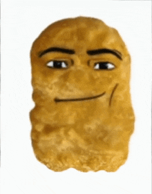a close up of a chicken nugget with a cartoon face on it .