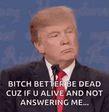 a man in a suit and tie is saying bitch better be dead cuz if u alive and not answering me .