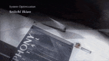 a system optimization seiichi ikiuo is written above a phony trail cd