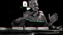 a blurry image of a man holding a sign that says ' a ' on it