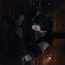 a woman in a dark room is holding onto a railing