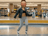 a woman with a man 's face on her head dancing