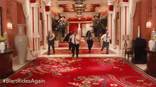 a group of people running down a hallway with the hashtag #blartrides again on the bottom