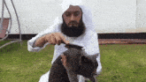 Mufti Mufti Menk GIF - Mufti Mufti Menk Cat Brush GIFs