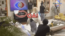 a group of people are standing in a living room with a woman standing in front of a television .