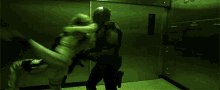 a man is kicking another man in a room with green lights