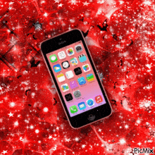 a cell phone is displayed on a red background