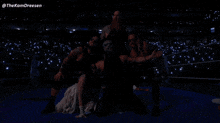a group of wrestlers are posing for a picture with the name thekamdreesen on the bottom