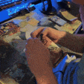 a person is holding a card that says ' a ' on it