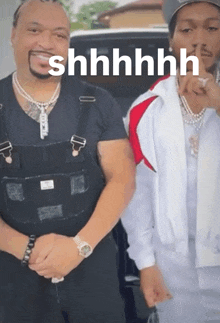 two men are standing next to each other with the word shhhh on the bottom