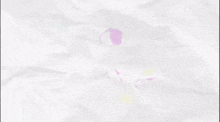 a drawing of a girl with purple hair and a purple collar is on a piece of paper .