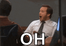 a man in a white shirt and tie is sitting at a desk with his mouth open and the word oh written below him