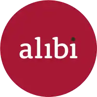 a red circle with the word alibi in white letters