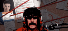 a man wearing headphones and sunglasses stands in front of a microphone surrounded by papers including a resume