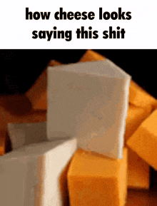 a stack of cheese cubes with the words how cheese looks saying this shit below them