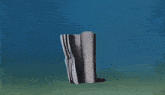 a painting of a gray object on a blue background