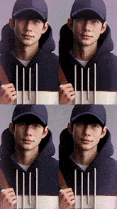 a man wearing a baseball cap and a hoodie