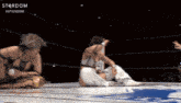 two women are wrestling in a ring with the word stardom on the bottom