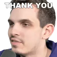 a close up of a man 's face with the words thank you above it