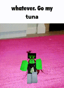 a cartoon character with green arms and legs says whatever go my tuna on a pink rug