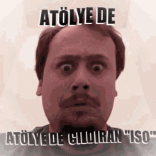 a man with a surprised look on his face and the words atölye de atölye de cildiran iso