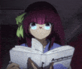 a girl wearing glasses is reading a book called angelplayer