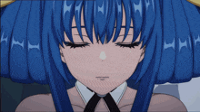 a close up of a girl 's face with her eyes closed