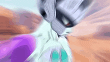 a blurry picture of a person 's face with a purple object in the foreground