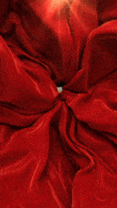 a red background with a gold circle that says volume