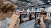 two young men are playing a game of playrack