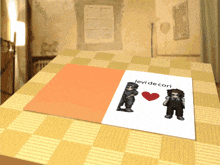 levi de cori is written on a piece of paper on a table