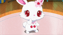 a white rabbit with red eyes and a flower on its ear
